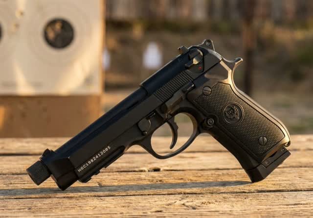 HG198 Full Metal M92 Gas Blowback Airsoft Pistol side profile on a shooting bench